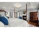 Comfortable main bedroom featuring a fireplace and stylish furnishings at 3330 Overland Dr, Roswell, GA 30075