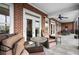 Covered outdoor patio offers comfortable seating and scenic views, perfect for enjoying the outdoors at 3330 Overland Dr, Roswell, GA 30075