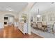 Open floor plan featuring a dining room, fireplace, and an archway at 530 Camber Woods Dr, Roswell, GA 30076