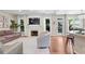 Bright living room featuring a fireplace, hardwood floors, and lots of natural light at 530 Camber Woods Dr, Roswell, GA 30076
