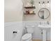 Cozy half-bathroom featuring updated fixtures and stylish decor, adding convenience and charm to the home at 530 Camber Woods Dr, Roswell, GA 30076