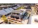 Aerial view featuring the Hopscotch Tavern with outdoor seating and surrounding commercial area at 6895 Whitman Walk, Alpharetta, GA 30005
