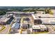 Aerial view of commercial real estate showcasing the layout, parking, and surrounding community at 6895 Whitman Walk, Alpharetta, GA 30005