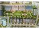 Birds-eye view of a well-designed community with lush green spaces, manicured lawns, and organized streets at 6895 Whitman Walk, Alpharetta, GA 30005