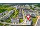 Beautiful new neighborhood with long rows of houses and a marker showing unit location at 6895 Whitman Walk, Alpharetta, GA 30005