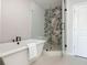 Elegant bathroom featuring a modern soaking tub and a glass-enclosed shower at 6895 Whitman Walk, Alpharetta, GA 30005
