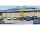 The Market Hall building with parking lot filled with cars at 6895 Whitman Walk, Alpharetta, GA 30005