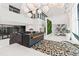 Bright lobby area with high ceilings, a reception desk, and decorative lighting at 775 Juniper St # 111, Atlanta, GA 30308