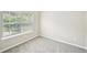 Bedroom with a large window letting in natural light at 1147 Saint Phillips Ct, Locust Grove, GA 30248