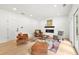 Cozy living room with a modern fireplace, recessed lighting, and access to the outdoors at 3684 Clearbrooke Way, Duluth, GA 30097