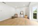 Bright living room featuring wood floors, recessed lights, a large window and contemporary decor at 3684 Clearbrooke Way, Duluth, GA 30097