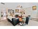Relaxing living room with decor, fan, fireplace, and convenient access to the staircase at 4161 Magnolia Glen Walk, Norcross, GA 30093