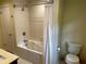 Bright bathroom featuring a separate jacuzzi tub with shower and linen closet at 4323 Darwen Ct, Tucker, GA 30084