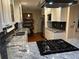 Modern kitchen showcasing granite countertops, stainless steel appliances, and white cabinetry at 4323 Darwen Ct, Tucker, GA 30084