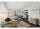Comfortable living room with hardwood floors, neutral tones, and ample natural light at 629 Dunton Se Cir, Smyrna, GA 30082