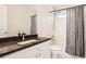 This bathroom features a full vanity, mirror, and shower with bathtub, and is ready for move-in at 750 Gates Ln, Alpharetta, GA 30022