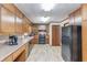 Bright eat-in kitchen with modern flooring and appliances at 1148 Woodland Cir, Lawrenceville, GA 30043
