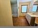 A full bathroom with a shower and tub and vanity with storage at 2480 Sewell Mill Rd, Marietta, GA 30062