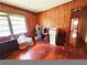 Office space with wood paneling, wood flooring and natural light at 2480 Sewell Mill Rd, Marietta, GA 30062