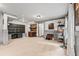 Open basement area with built-in storage, wood paneling, and modern decorative touches at 435 Ruby Forest Pkwy, Suwanee, GA 30024