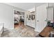 Spacious bathroom featuring tiled floor, double vanity, and doorway leading to bedroom at 435 Ruby Forest Pkwy, Suwanee, GA 30024