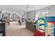 Expansive bonus room with plush carpeting, plenty of space for play and relaxation at 435 Ruby Forest Pkwy, Suwanee, GA 30024