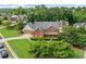 Beautiful two-story brick home with a manicured lawn and attached two-car garage at 435 Ruby Forest Pkwy, Suwanee, GA 30024