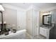 Bathroom featuring granite vanity, tile floor, soaking tub and glass shower at 50 Worthington Dr, Villa Rica, GA 30180