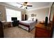 Comfortable bedroom with natural light, a ceiling fan, and neutral decor at 50 Worthington Dr, Villa Rica, GA 30180