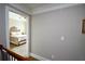 A cozy bedroom features neutral walls, crown molding, and a decorative bed frame at 50 Worthington Dr, Villa Rica, GA 30180