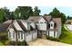 Lovely two-story home featuring a two-car garage and well-maintained landscaping at 50 Worthington Dr, Villa Rica, GA 30180