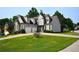 Beautiful two-story home with a manicured lawn, complemented by a two-car garage at 50 Worthington Dr, Villa Rica, GA 30180