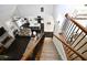 Open-concept living room showcasing a fireplace, hardwood floors, and abundant natural light at 50 Worthington Dr, Villa Rica, GA 30180