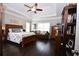 Spacious main bedroom boasts a tray ceiling, hardwood floors, and ample natural light at 50 Worthington Dr, Villa Rica, GA 30180