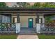 Charming front porch with stylish railings and small plants that add character to this home at 872 Beryl Sw St, Atlanta, GA 30310