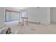 Bright living room featuring sliding glass doors at 120 Wood River Ct, Johns Creek, GA 30097