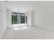 Spacious unfinished room featuring a modern open window design with natural light at 120 Wood River Ct, Johns Creek, GA 30097