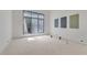 Well-lit room showcasing paint samples and a large window in a new home under construction at 120 Wood River Ct, Johns Creek, GA 30097