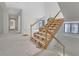 Interior staircase construction with natural light, showcasing unfinished design elements at 120 Wood River Ct, Johns Creek, GA 30097