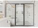 Bathroom highlighting a soaking tub, glass shower, and modern fixtures at 1995 Venetian Sw Dr, Atlanta, GA 30311