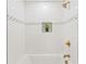 Bathroom with white subway tile, black fixtures, and decorative border at 1995 Venetian Sw Dr, Atlanta, GA 30311