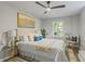 Bedroom featuring recessed lights, a ceiling fan, and an accent wall painting at 1995 Venetian Sw Dr, Atlanta, GA 30311