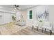 Comfortable finished basement with stylish decor, including art and decorative chairs and a gray sofa at 1995 Venetian Sw Dr, Atlanta, GA 30311