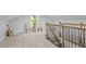 Upstairs loft living room with railing and an airy feel with a comfortable seating area at 1995 Venetian Sw Dr, Atlanta, GA 30311