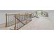 Upstairs loft living room with railing and an airy feel with a comfortable seating area at 1995 Venetian Sw Dr, Atlanta, GA 30311