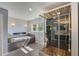 This bathroom offers a soaking tub and a spacious glass shower at 202 Heights, Canton, GA 30114