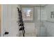 Bathroom boasting a glass shower with white subway tile and a convenient ladder for storing towels at 202 Heights, Canton, GA 30114