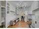 Versatile bonus room with hardwood floors, modern lighting, and built-in storage solutions at 202 Heights Pl, Canton, GA 30114