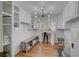 Bright bonus room with hardwood floors, custom lighting, and storage space at 202 Heights, Canton, GA 30114