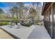 Tranquil deck with outdoor dining area, hammock, and view of surrounding greenery at 202 Heights, Canton, GA 30114